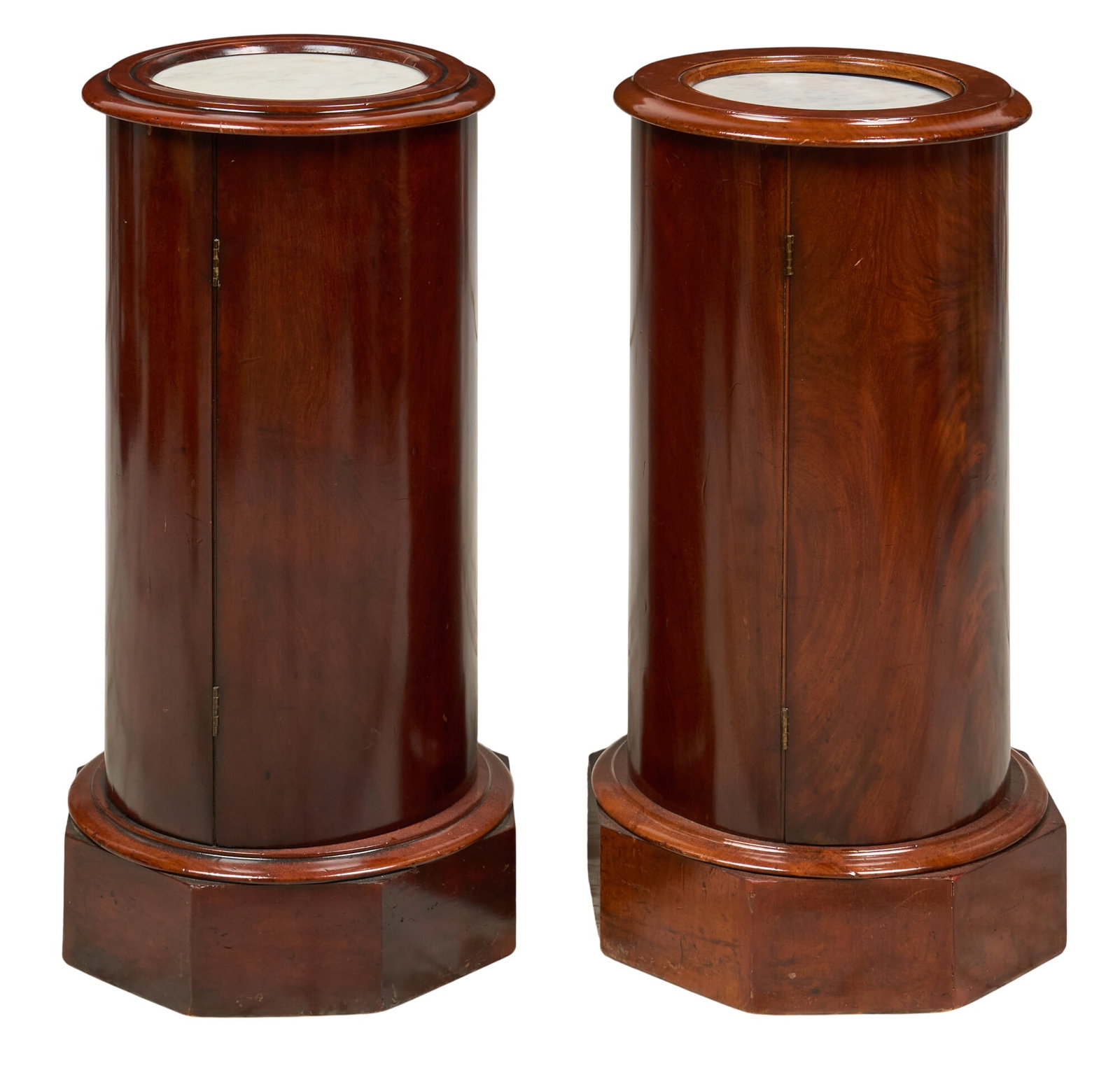 Pair of Marble Top Cabinet Side Tables: Pair of marble top cylindrical side tables with interior storage height 29 in. x width 16 in. x depth 16 in. / each Provenance: Property from a home in Fort Collins, Colorado 