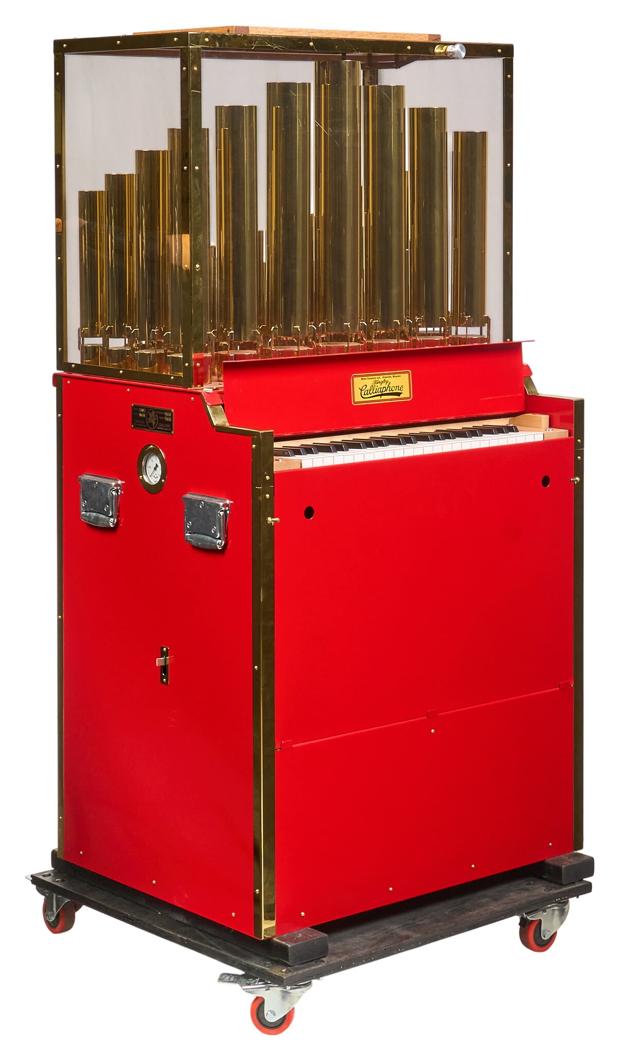 Tangley Air Calliope Model CA-43: Miner Company Tangley Calliaphone air-powered calliope instrument, model CA-43, with brass whistle popes housed within glass and brass display case over red cabinet with keyboard and paper music