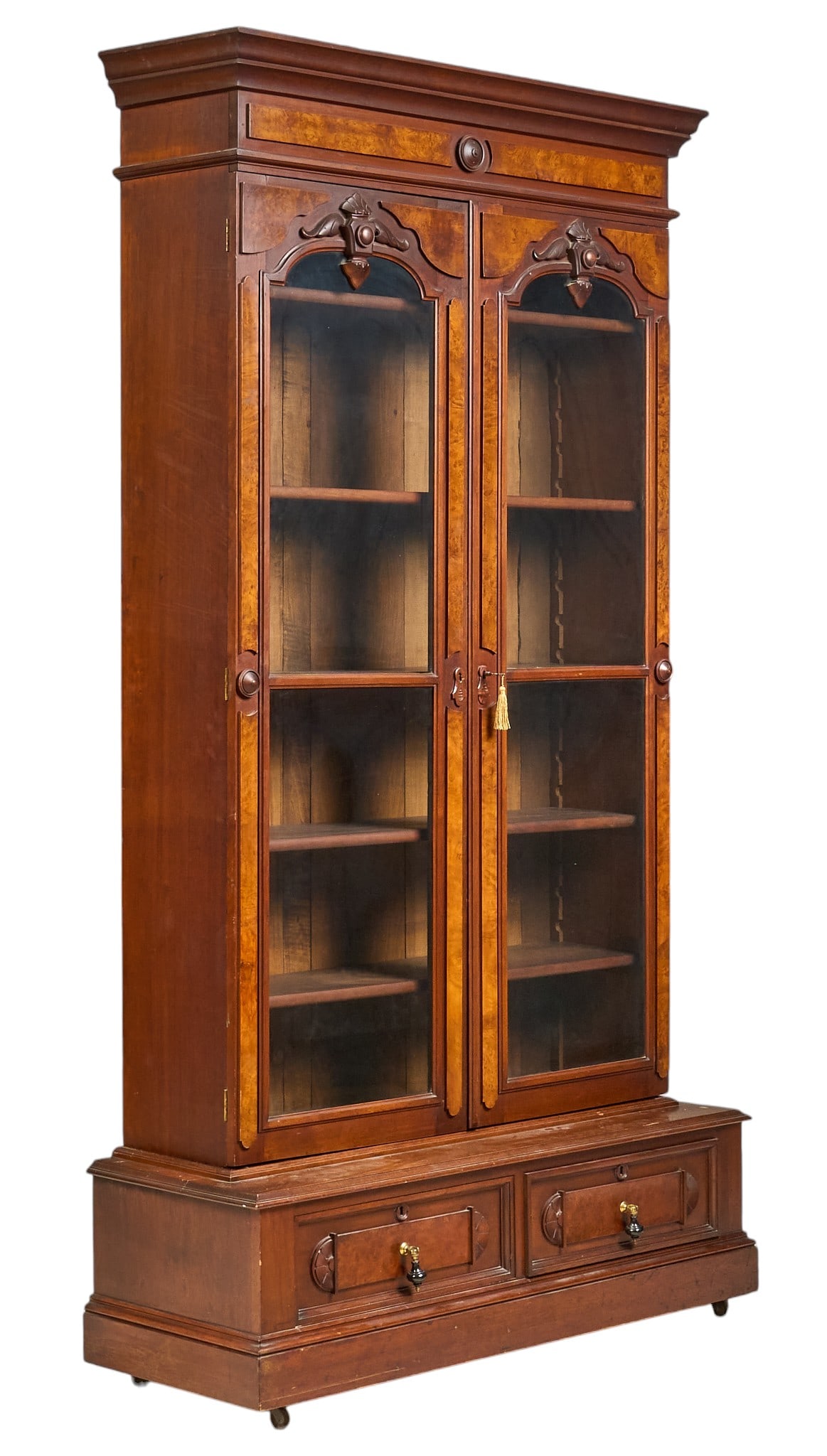 Georgian Display Cabinet: Georgian cabinet with glass-front doors, interior shelving and bottom storage height 88 in. x width 47 in. x depth 17.5 in. Provenance: Property from a home in Boerne, TX
