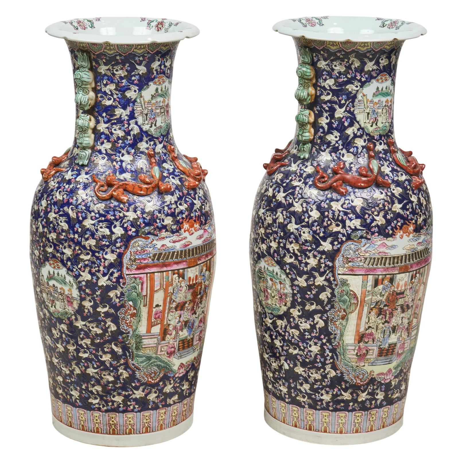 Pair of Chinese Floor Vases: Pair of vintage Chinese Famille rose porcelain floor vases with blue colorway, decorated with floral and figural motifs, and applied details, circa 20th century height 37 in. x width 15