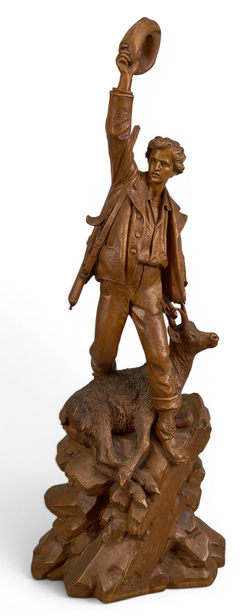 Attrib. Johann Huggler, Huntsman Carving, ca. 19th C.: Attrib. Johann Huggler (Switzerland, 1834-1912), freestanding huntsman sculpture, hand carved wood, circa late 19th century, stamped "Albert Schild / Interlaken" stamp to
