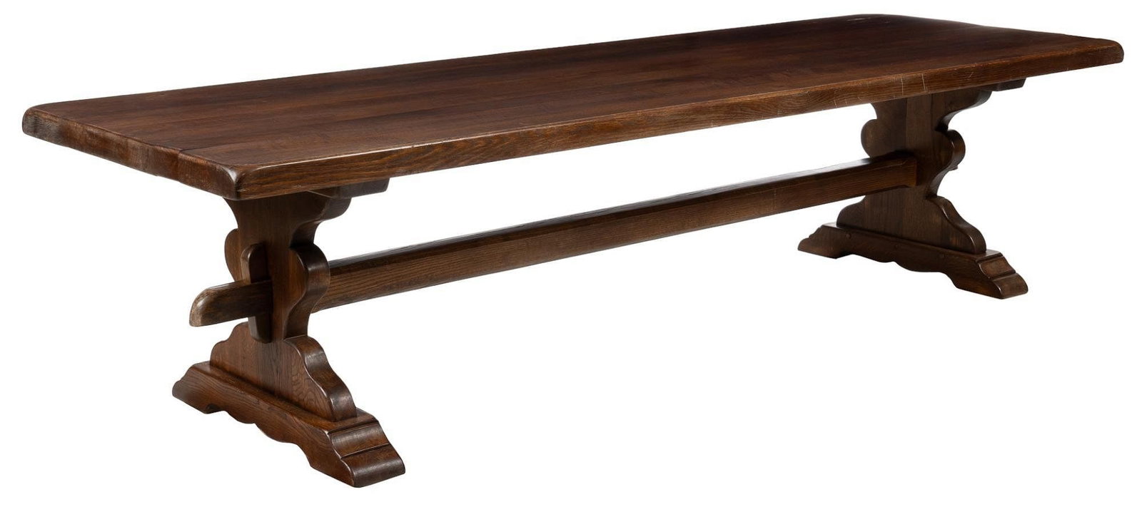 Vintage French Farmhouse Harvest Table: Vintage French farmhouse harvest table, with thick, oversize top, supported on trestle legs with support beam height 30 in. x width 118 in. x depth 38 in. Provenance: Property from a home in