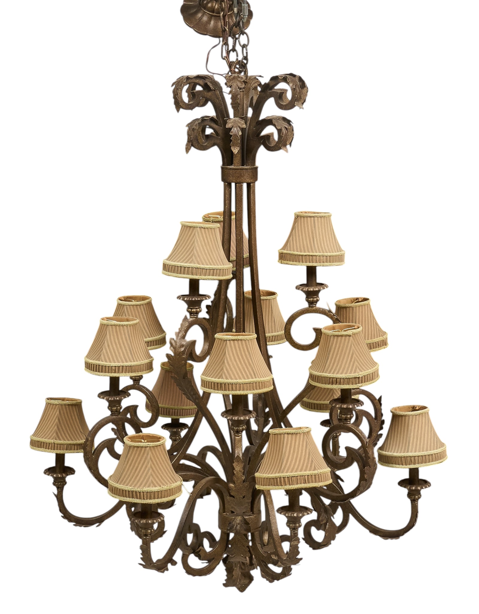 Chandelier: Metal chandelier with scrolled arms with shade coverings height 51.5 in. x width 38 in. x depth 41 in. Provenance: Property from a home in San Antonio, Texas