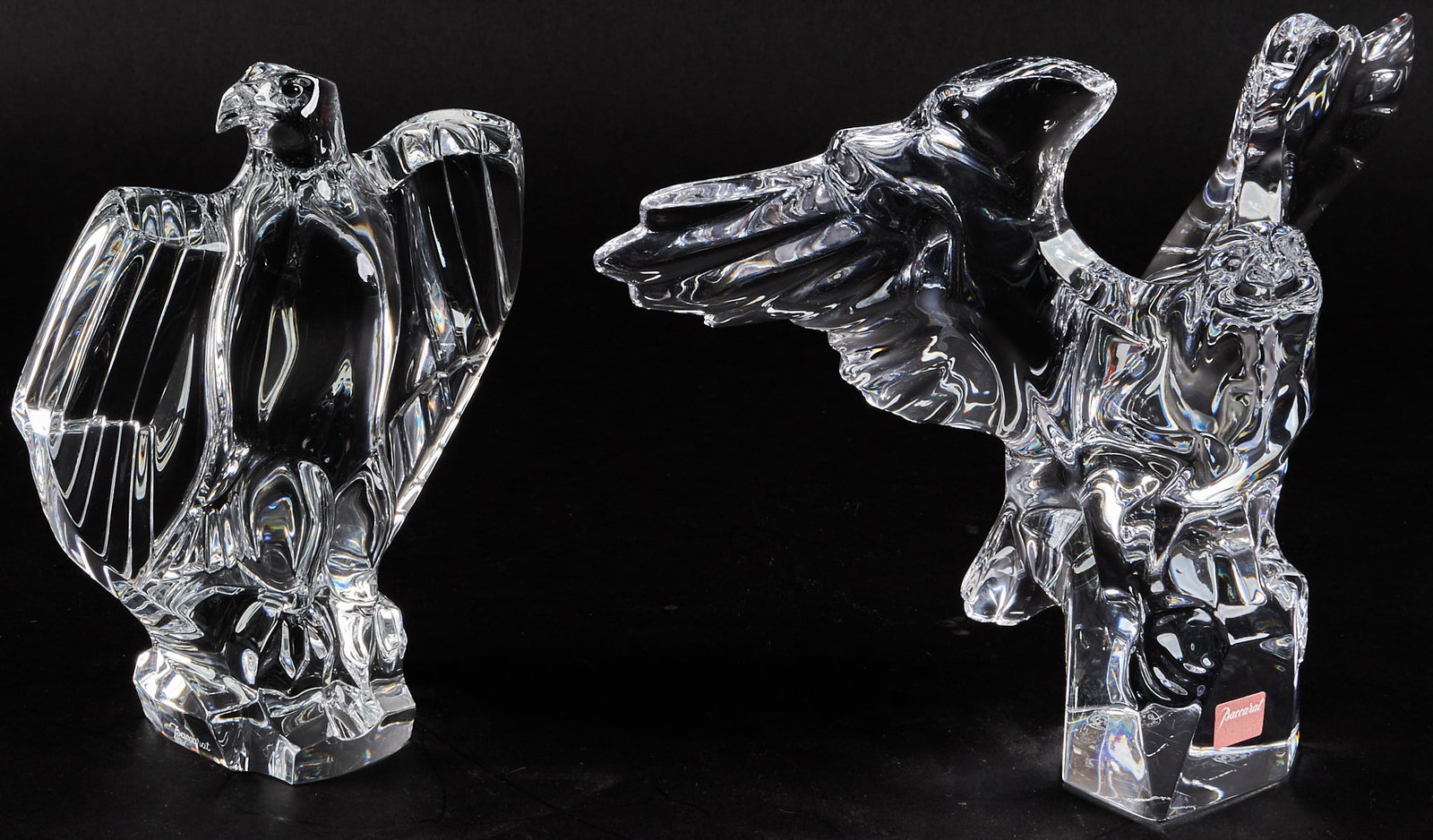 (2) Baccarat Eagle Figurines: Two Baccarat crystal eagle figurines, marked height 7 in. x width 10 in. x depth 4 in. / largest Provenance: Property from the Estate of Robert A. "Bob" Funk Sr. - trailblazing American