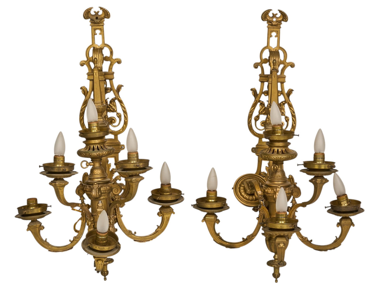 Pair of Gilt Wall Sconces: Pair of gilt-bronze wall sconces with frosted shades height 31 in. x width 20 in. x depth 22 in. Provenance: Property from a home in San Antonio, Texas Condition: Two loose arms, previously repaired&n
