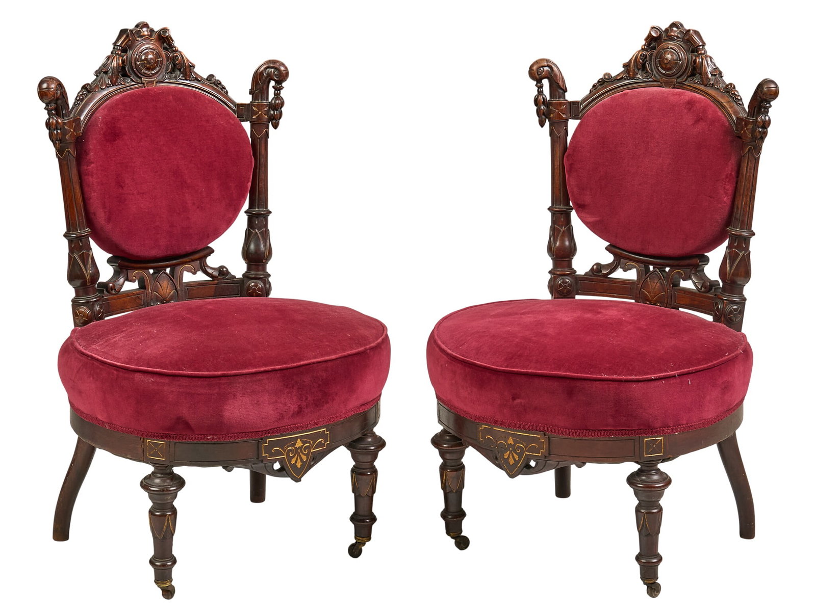 Pair of Victorian Style Parlor Chairs: Pair of Victorian style red velvet parlor chairs with carved wooden frame height 38 in. x width 23 in. x depth 22 in. / each Provenance: Property from a home in Boerne, TX