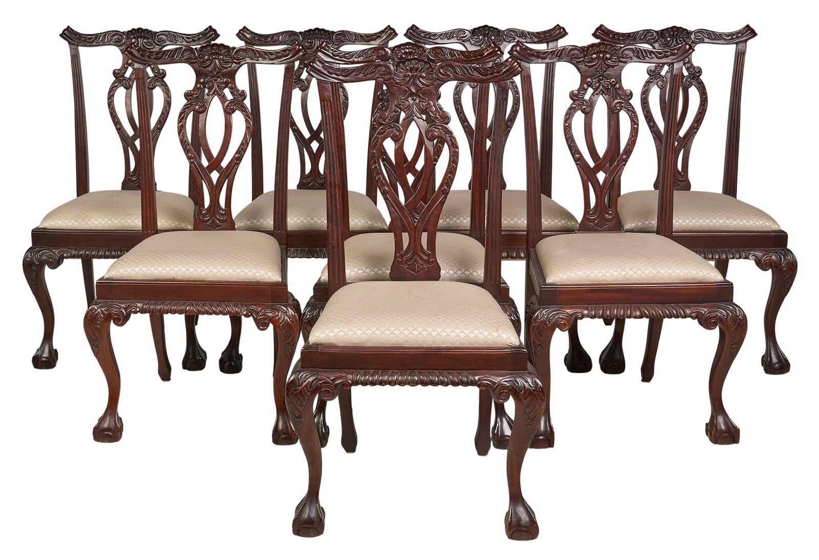 (8) Chippendale Dining Chairs: Set of eight carved Chippendale style chairs with decorative backs height 42 in. x width 23.5 in. x depth 24 in. / Texas Provenance: Property from a home in San Antonio, Texas