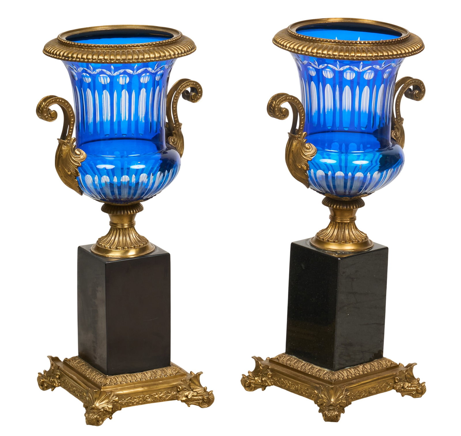Pair of Bohemian Urns: Pair of ornate blue glass urns with ormolu mountings and black stone bases height 26 in. x width 14 in. x depth 11 in. / each Provenance: Property from the Estate of Robert A. "Bob" Funk