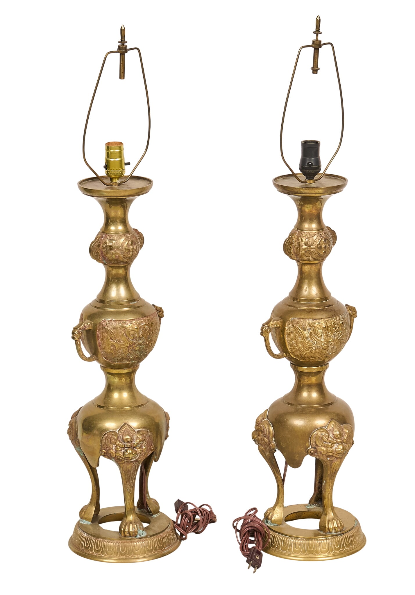 Pair of Chinese Brass Lamps: Pair of mid-century Chinese brass table lamps height 37 in. x width 8.5 in. x depth 7 in. / each Provenance: Property from a home in San Antonio, Texas