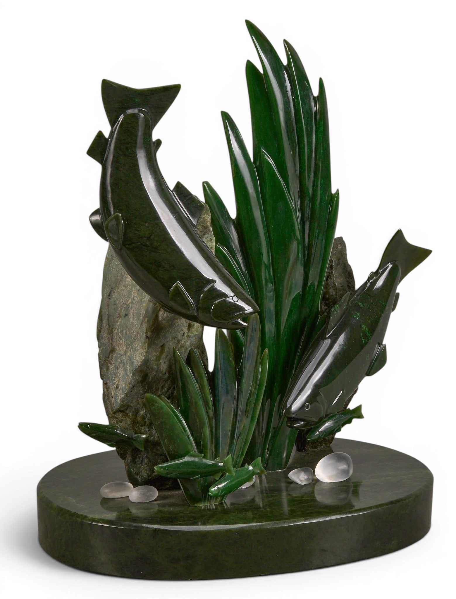 Charles C. Min Hu, Nephrite Jade Eagle Sculpture: Charles C. Min Hu (Canada, 20th century) nephrite jade sculpture depicting fish, supported on black stone base, signed on base height 19.5 in. x width 14.5 in. x depth 10.5 in. Provenance: