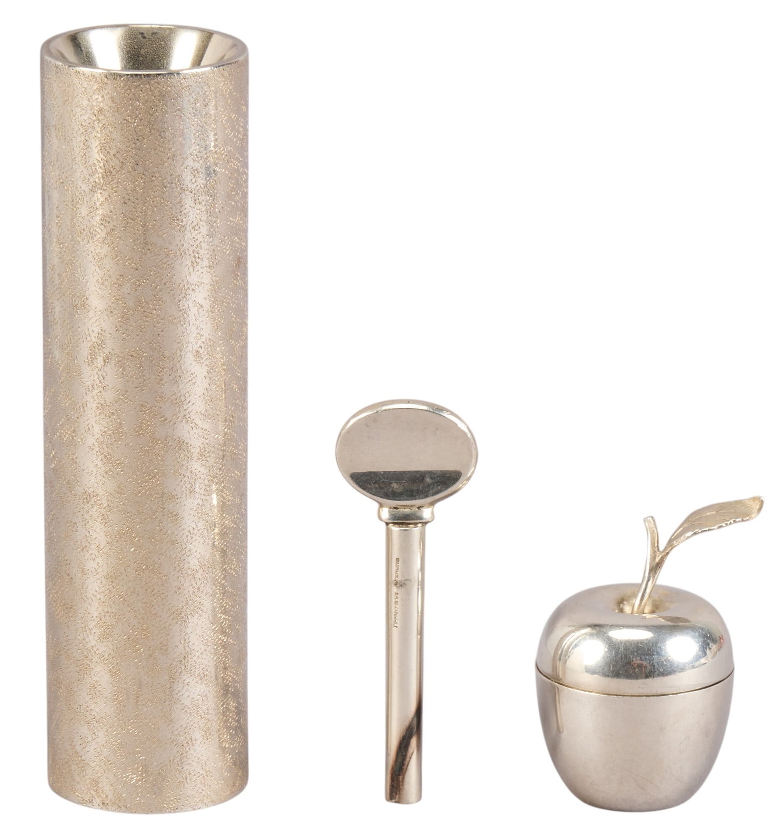 Tiffany & Co. Sterling Apple Dish, Toothpaste Key, and Bud Vase: Tiffany & Co. sterling silver apple vessel, flower bud vase, and toothpaste key, all marked Total weight: 6.8 ozt Provenance: Property from an estate collection at a home in the Lincoln Heights