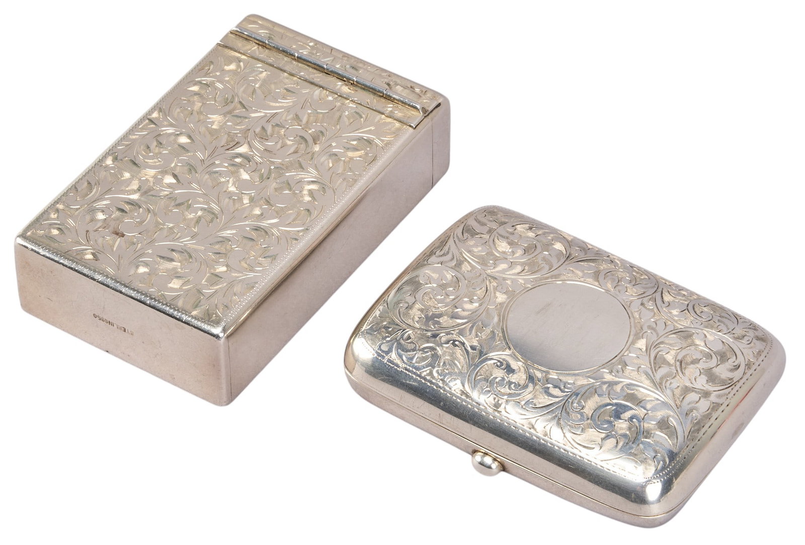 (2) Vintage Sterling Silver Cigarette Cases: Two sterling silver repousse cigarette cases Total weight: 5.0 ozt Provenance: Property from an estate collection at a home in the Lincoln Heights neighborhood of San Antonio, Texas
