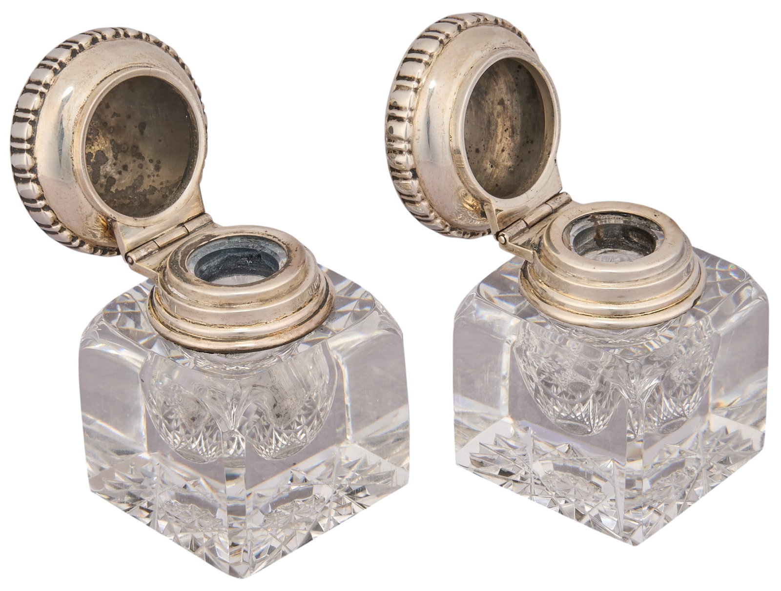 Pair of Vintage Ink Wells: Pair of vintage ink wells, with sterling silver tops Total weight: 2.0 ozt Provenance: Property from an estate collection at a home in the Lincoln Heights neighborhood of San Antonio, Texas