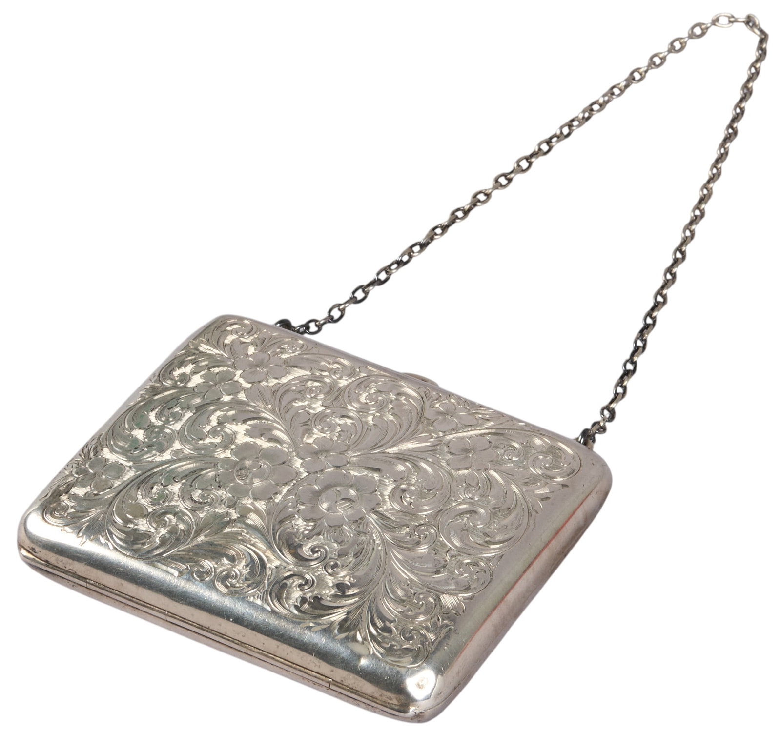 Sterling Silver Repousse Purse: Sterling silver repousse purse with chain strap Size: 3.5 in. x 3 in. Total weight: 3.0 ozt Provenance: Property from an estate collection at a home in the Lincoln Heights neighborhood of