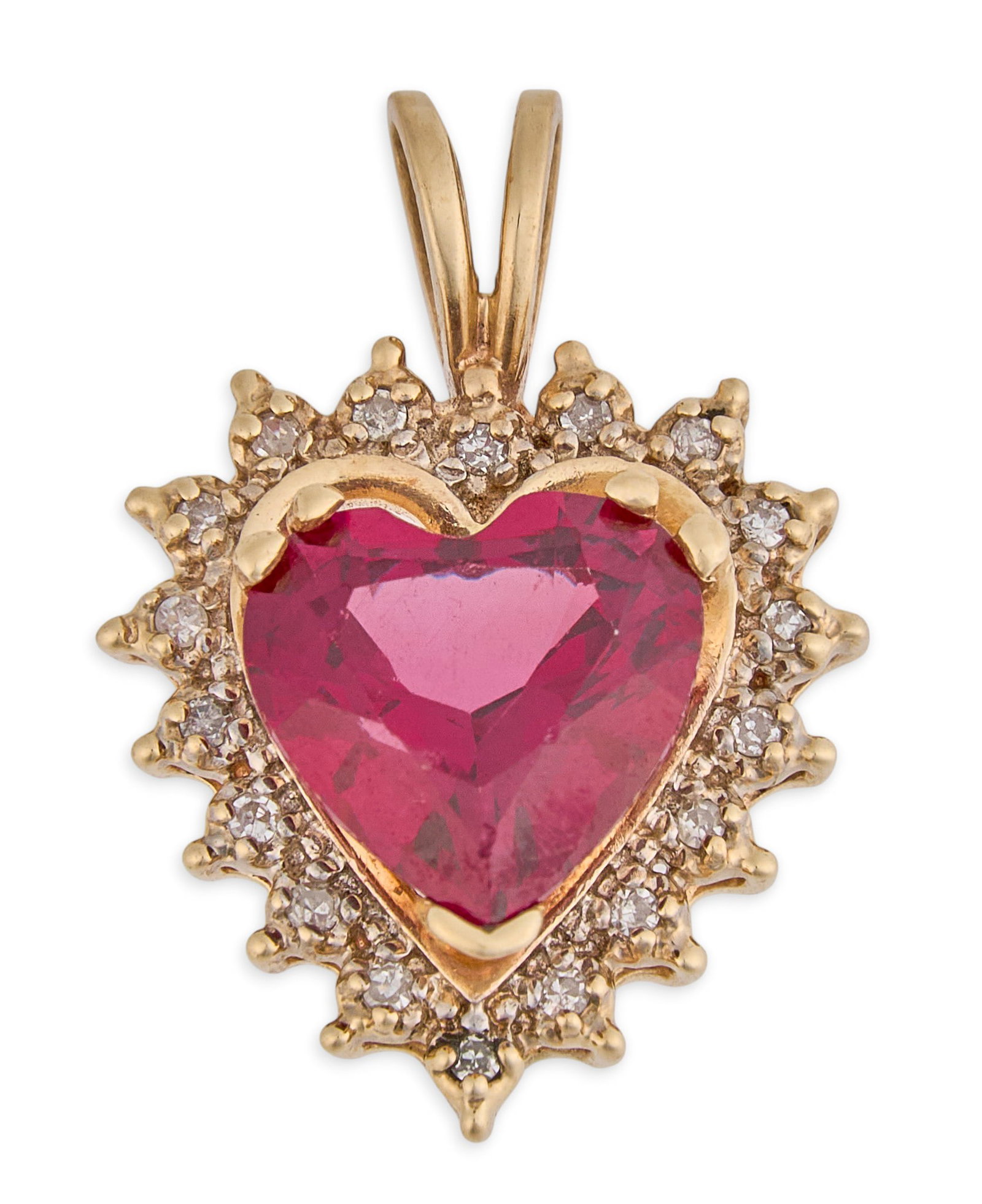 14K Ruby & Diamond Heart Pendant: 14K yellow gold heart pendant, set with heart cut ruby center stone, with round cut diamond halo, marked "14K" Size: 7/8 in. long Total weight: 2.9 g Provenance: Property from a home in San
