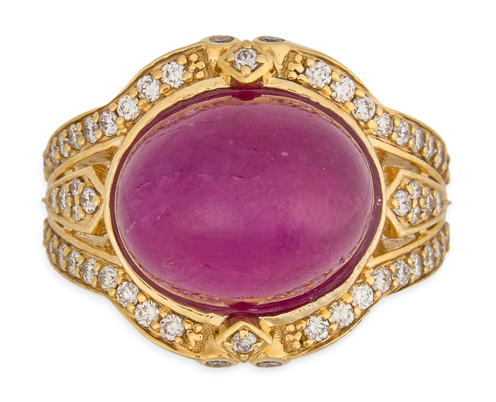 14K Ruby & Diamond Cocktail Ring: 14K yellow gold cocktail ring set with a large oval cabochon ruby center stone, approximately 11.83 ct, accented by round brilliant cut diamonds, approximately 0.54 ctw, graded G–H color,