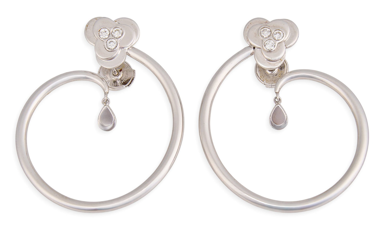 18K Diamond Hoop Earrings: Pair of 18K white gold hoop earrings, set with round cut diamond details, marked "750" Length: 1.5 in. Total weight: 18.8 g Provenance: Property from a home in San Antonio, Texas