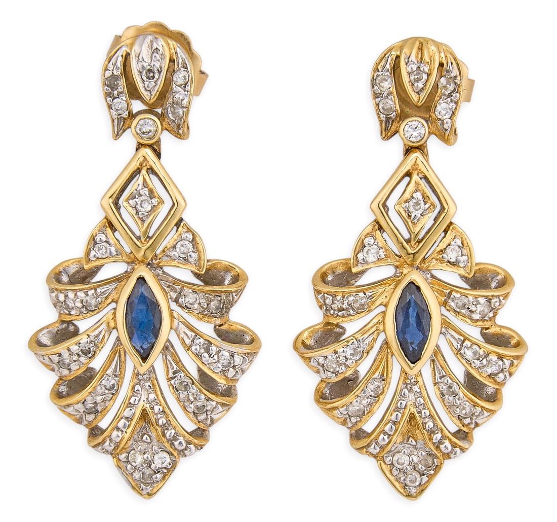 18K Diamond & Sapphire Earrings: Pair of 18K two-tone earrings, set with round cut diamonds and marquise cut sapphire center stones, marked "18K" to posts Length: 1.25 in. Total weight: 6.49 g Provenance: Property