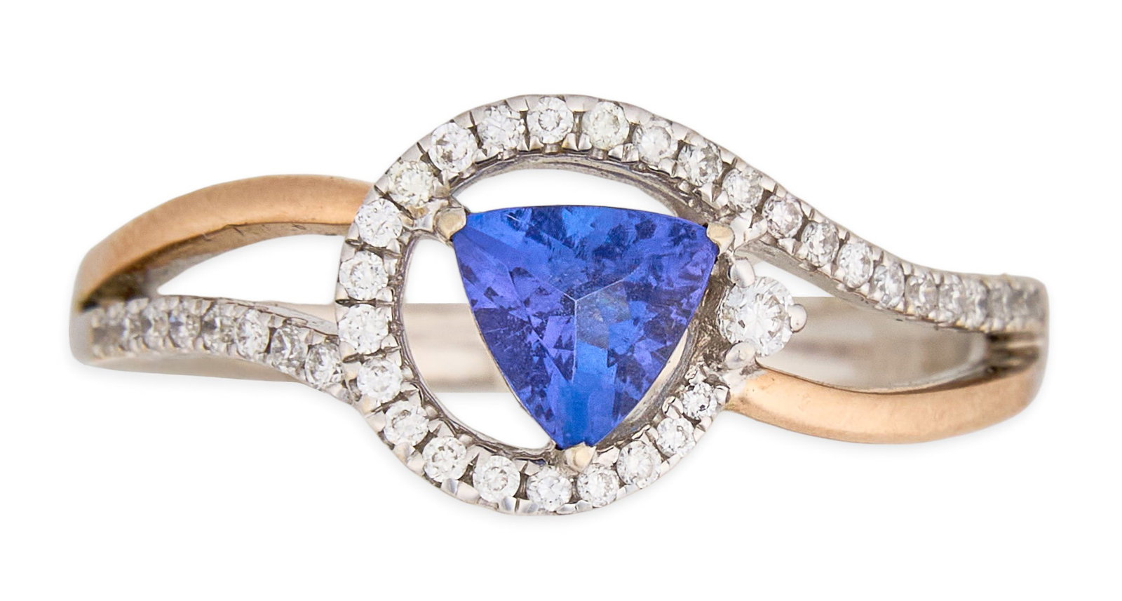 14K Tanzanite & Diamond Ring: 14K gold two-tone ring, set with trilliant cut tanzanite center stone, accented by round diamonds to shank, marked "14K" Size: 8.25 Total weight: 3.6 g Provenance: Property from