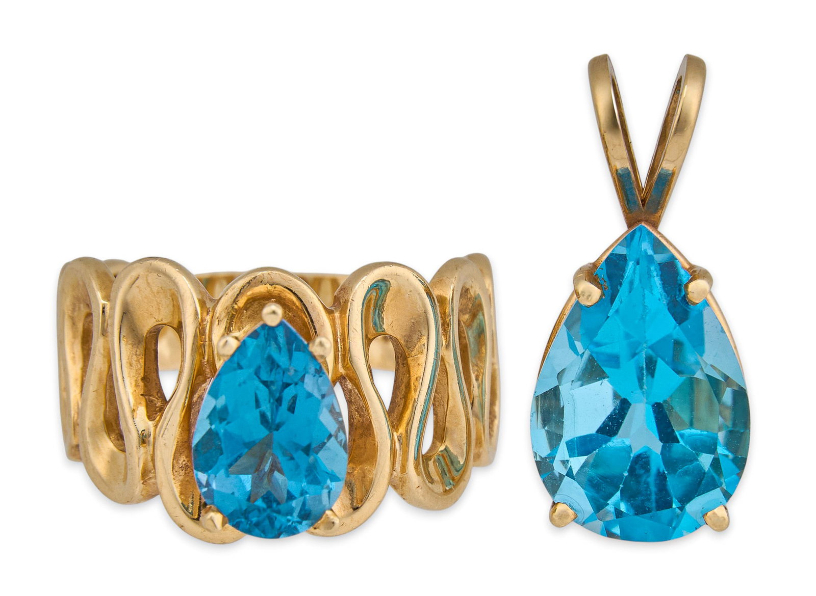 14K Blue Topaz Pendant and Ring: 14K yellow gold ring and pendant set, each set with pear cut blue topaz, pendant stone approximately 5 ct, ring stone approximately 1.5 ct, both marked "14K" Ring size: 7 Pendant