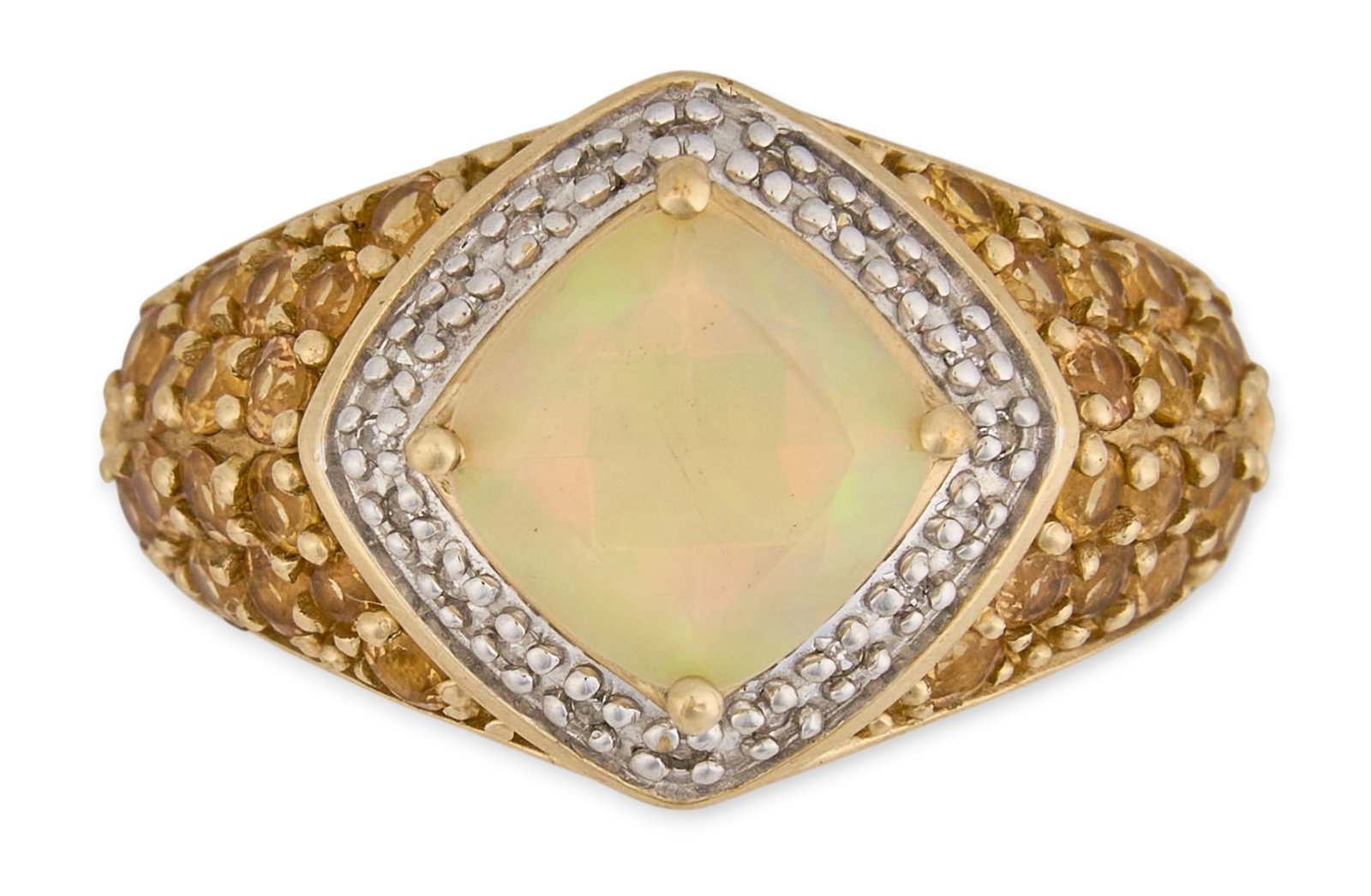 10K Opal & Diamond Ring: 10K yellow gold ring, set with cushion cut opal center stone, accented by diamond halo, with pave set citrine to shank, marked "10K" Size: 8 Total weight: 4.6 g Provenance: Propert