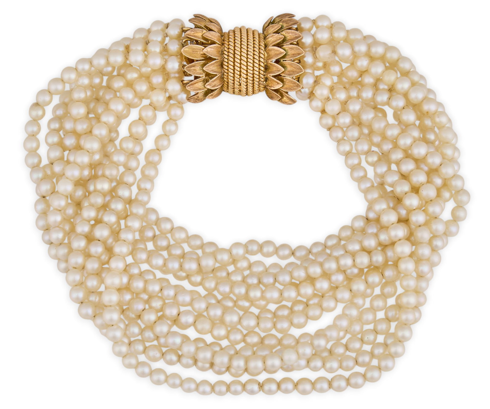 14K Seed Pearl Bracelet: Twelve-strand seed pearl bracelet, with 14K yellow gold clasp, marked "14K" Length: 7.5 in. Provenance: Property from the Estates of Lewis and Catharine Cocke “Tinka”