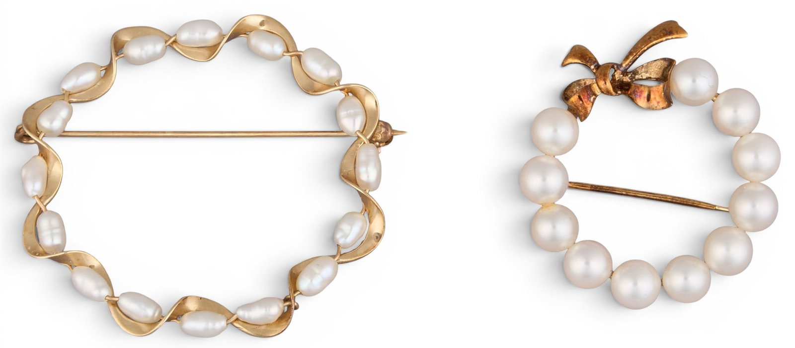 (2) 14K Pearl Brooches: Two 14K yellow gold pearl brooches, marked "14K" and "585" Size: 1.75 in. x 1.5 in. / largest Total weight: 8.6 g Provenance: Property from an estate collection at a home in the
