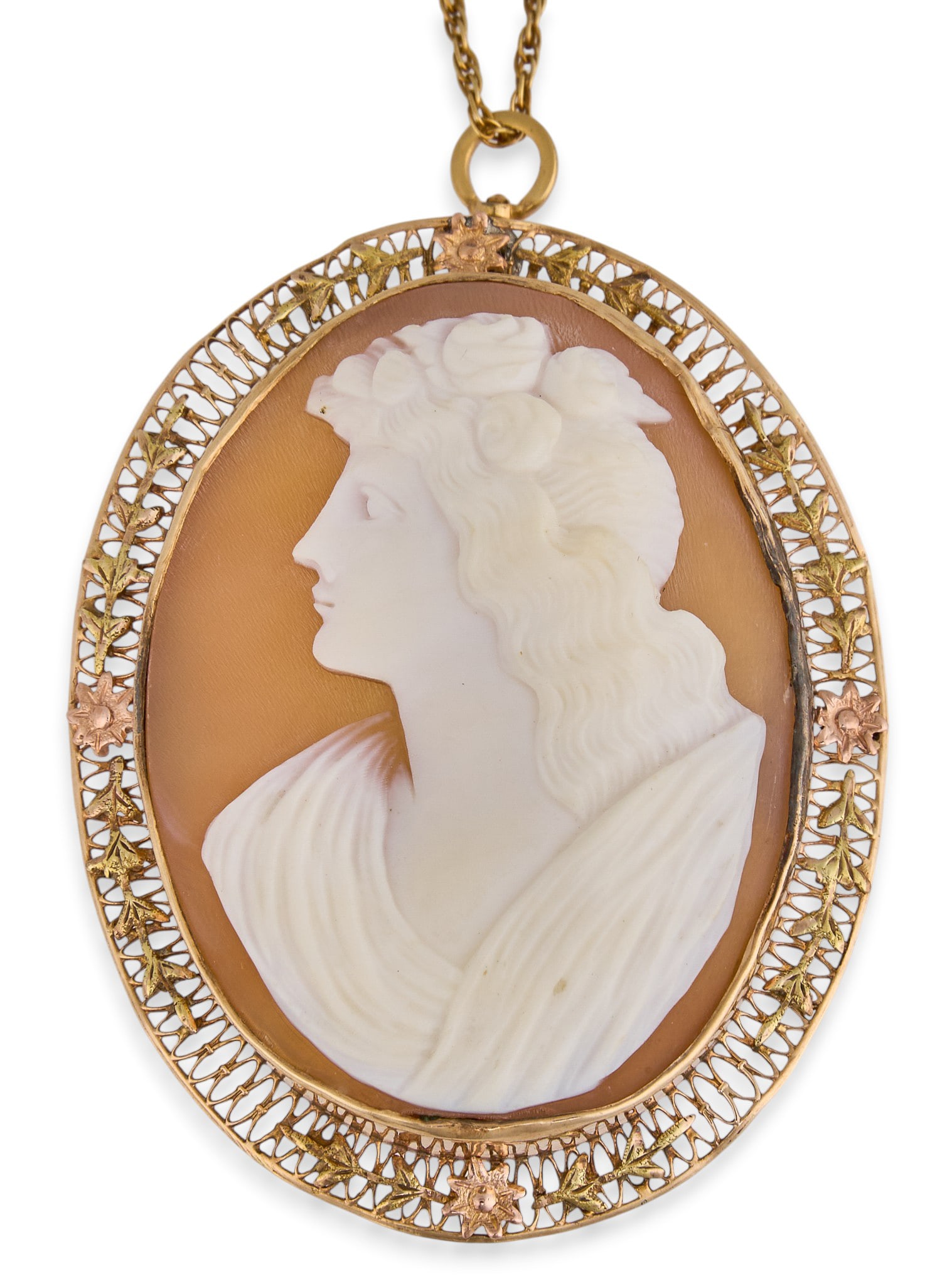 10K/14K Cameo Pendant Necklace: Antique shell cameo pendant, housed in 10K yellow gold (tested) filagree setting with floral motifs, depicting female figure's side profile, on 14K yellow gold chain, marked "14K" to
