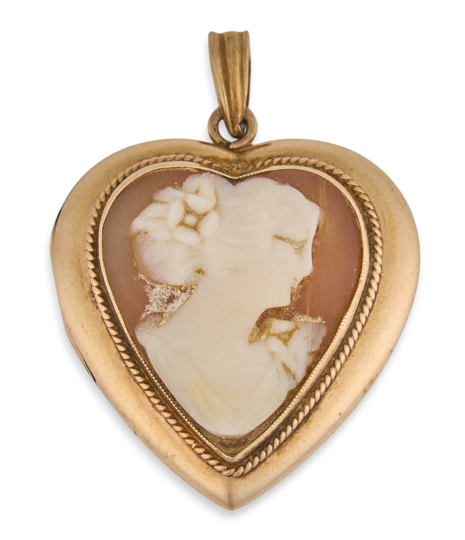 10K Shell Cameo Locket Pendant: 10K yellow gold heart shaped locket pendant, set with shell cameo depicting female figure's side profile, marked "10K" Size: 1.25 in. x 1 in. Total weight: 4.5 g Provenance: Property
