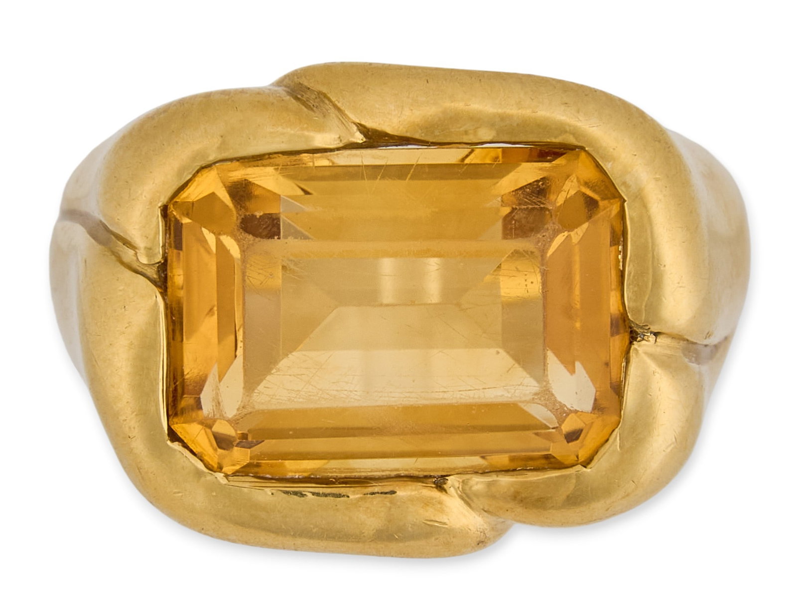 18K Citrine Ring: 18K yellow gold ring, set with single emerald cut citrine, marked "750" Size: 8 Total weight: 11.48 g Provenance: Property from an estate collection at a home in the Lincoln Heights