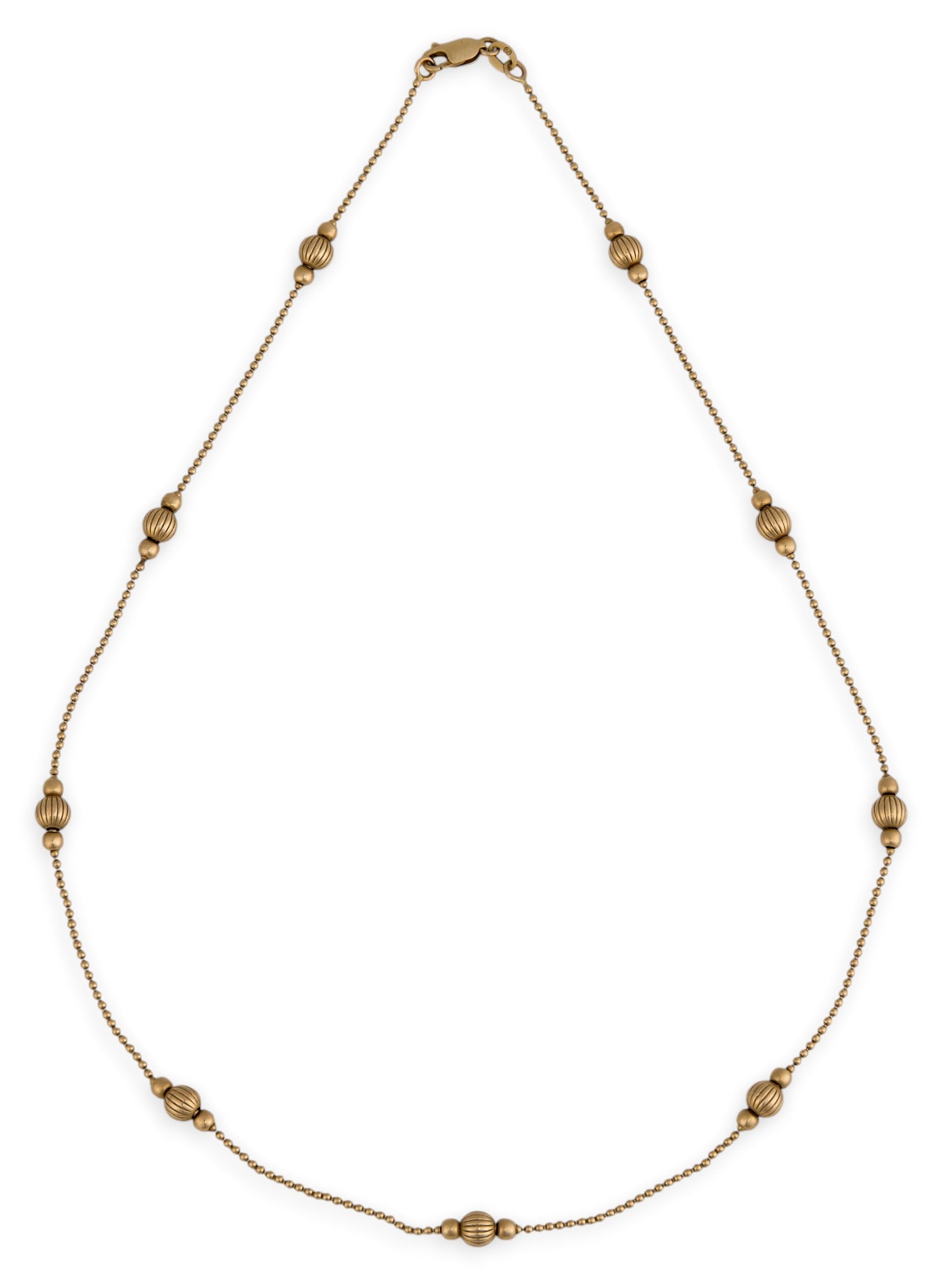 Vintage 14K Station Necklace: Vintage 14K yellow gold station necklace, with ribbed beads, marked "14K Italy" Length: 18 in. Total weight: 7.66 g