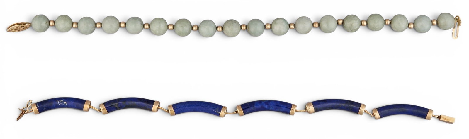 (2) 14K Gemstone Bracelets: Two 14K yellow gold bracelets, set with lapis and jade links/beads, each marked "14K" to clasp Length: 8 in. / longest Total weight: 21.3 g Provenance: Property from an estate