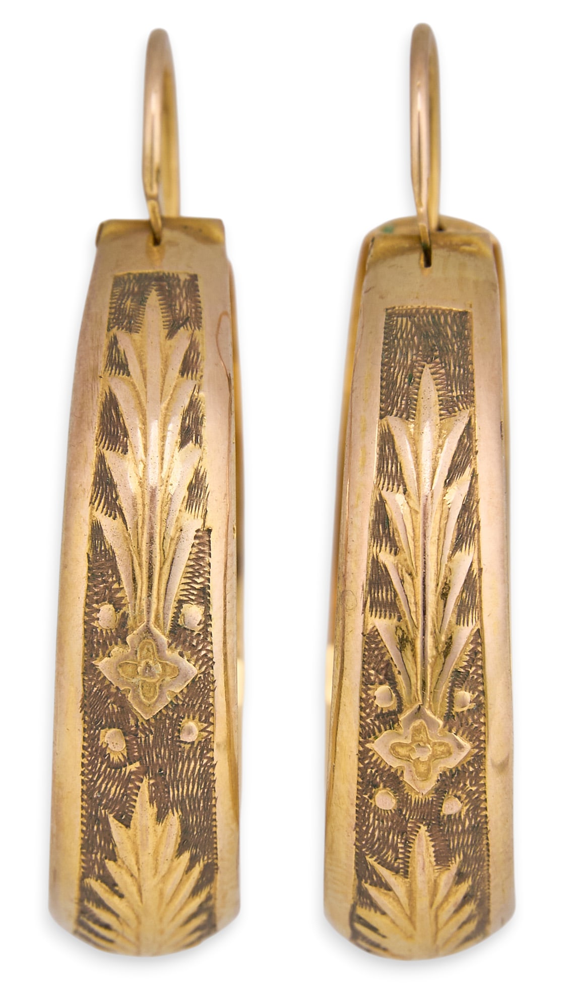 10K Etched Hoop Earrings: 10K yellow gold (tested) hoop earrings, with etched floral motifs to exterior Size: 1.25 in. diameter Total weight: 6.7 g Provenance: Property from an estate collection at a home in the