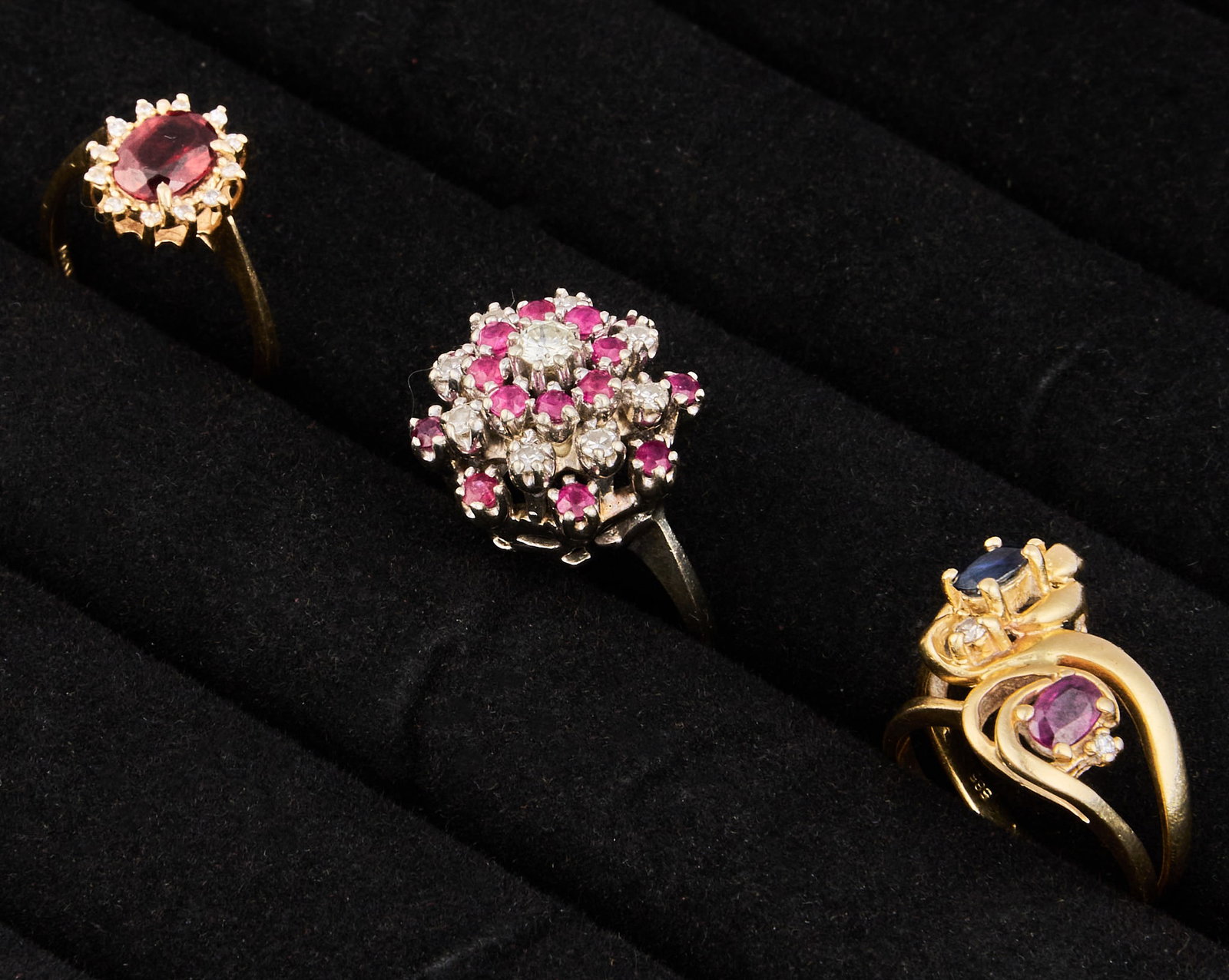 (3) 14K Gemstone Rings: Three 14K yellow gold rings, set with various gemstones, all marked Size: 6.5, 7 Total weight: 15.9 g Provenance: Property from an estate collection at a home in the Lincoln Heights neighborhood 