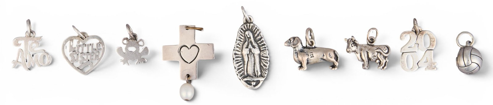 (8) James Avery Sterling Charms: Collection of eight James Avery sterling silver charms, various motifs, marked Total weight: 0.8 ozt Provenance: Property from an estate collection at a home in the Lincoln Heights neighborhood
