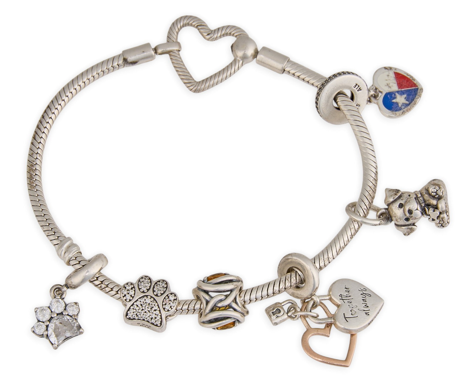 Pandora Sterling Silver Charm Bracelet: Pandora sterling silver charm bracelet with assorted charms, marked "Pandora" to clasp, and each charm marked Length: 7.5 in. Total weight: 1.05 ozt Provenance: Property from an estate