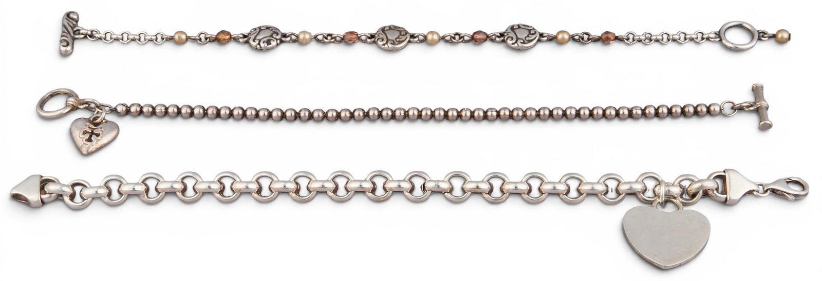 (3) Sterling Silver Bracelets: Three sterling silver bracelets, various lengths and styles, marked Length: 7.75 in. / longest Total weight: 1.15 ozt Provenance: Property from an estate collection at a home in the Lincoln