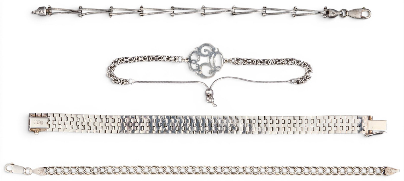 (4) Sterling Silver Bracelets: Four sterling silver bracelets, various lengths and styles, all marked Length: 8 in. / longest Total weight: 1.4 ozt Provenance: Property from an estate collection at a home in the Lincoln