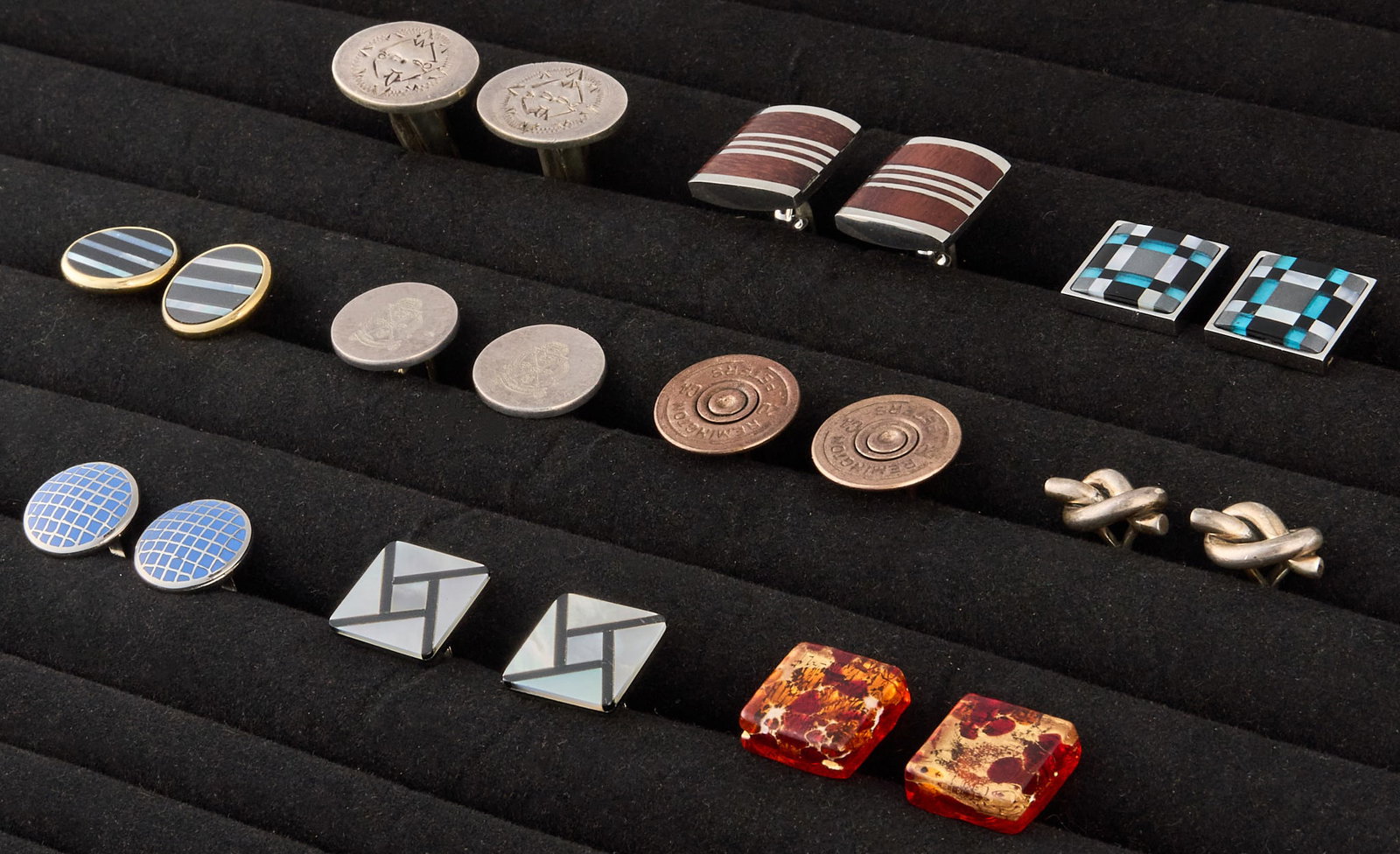 (10) Pairs of Assorted Cufflinks: Ten pairs of assorted cufflinks, including sterling and stainless steel examples Total weight: 1.0 ozt Provenance: Property from an estate collection at a home in the Lincoln Heights