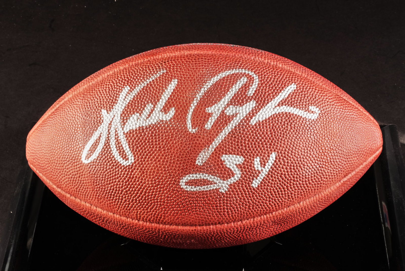Walter Payton Signed Football: Football signed by Walter Payton, football running back who played for Chicago Bears from 1975-1987, in display case height 9.5 in. x width 15 in. x depth 11 in. Provenance: Property from