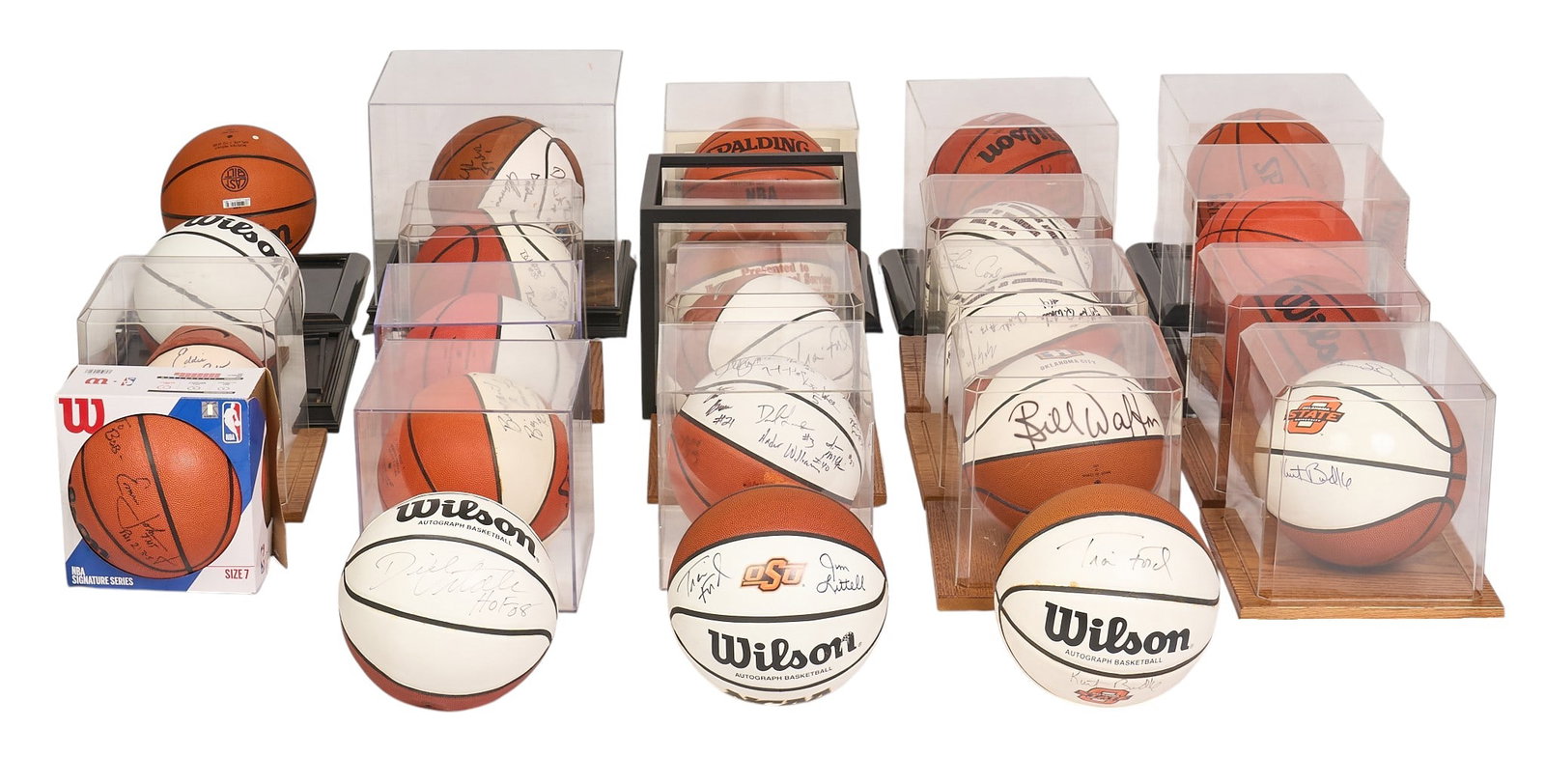 (23) Signed Basketballs: Collection of twenty-three signed basketballs with signatures from such athletes as Larry Bird, Travis Ford, Jim Littell, Brent Price, Mark Price, Sean Sutton, Dick Vital, Bill Walton, and others;