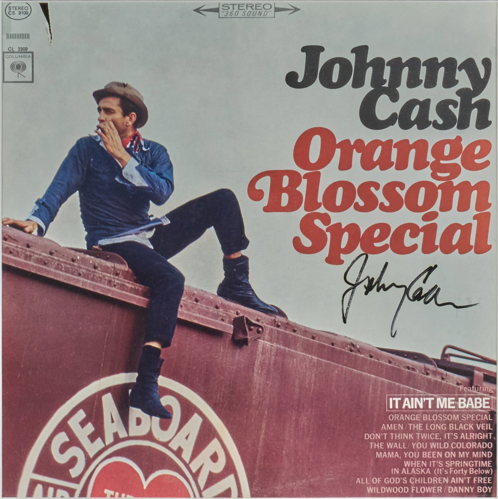 Johnny Cash Signed 1965 Orange Blossom Special Album Cover: Framed Johnny Cash signed 1965 Orange Blossom Special Album cover height 19.5 in. x 19.5 in. Provenance: Property from the Estate of Robert A. "Bob" Funk Sr. - trailblazing