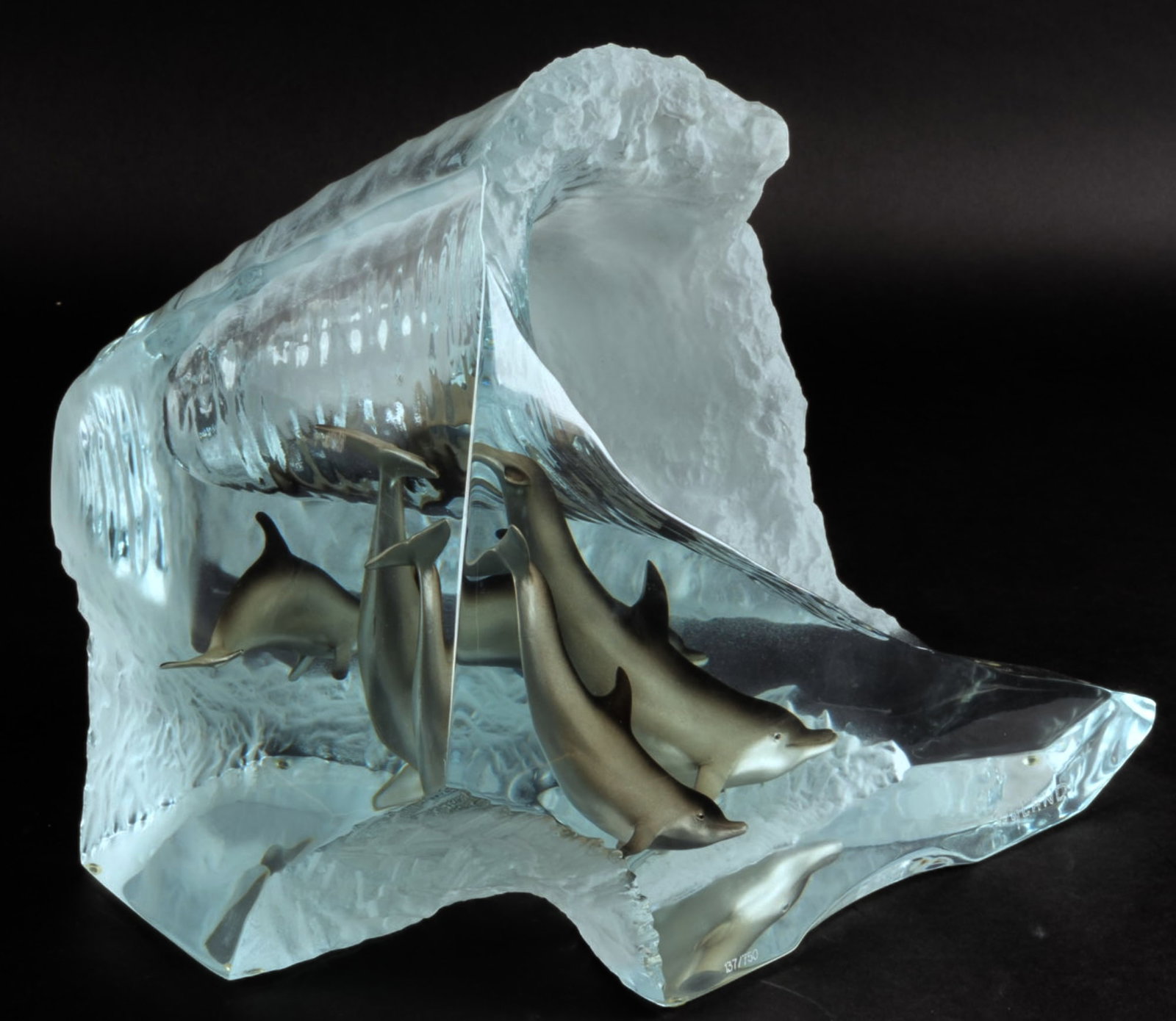 Robert Wyland, "Big Wave": Robert Wyland (California / Michigan, b. 1956), "Big Wave", limited edition lucite sculpture with encased dolphins, signed and numbered 137/750 height 10.5 in. x width 13 in. x depth 10.5