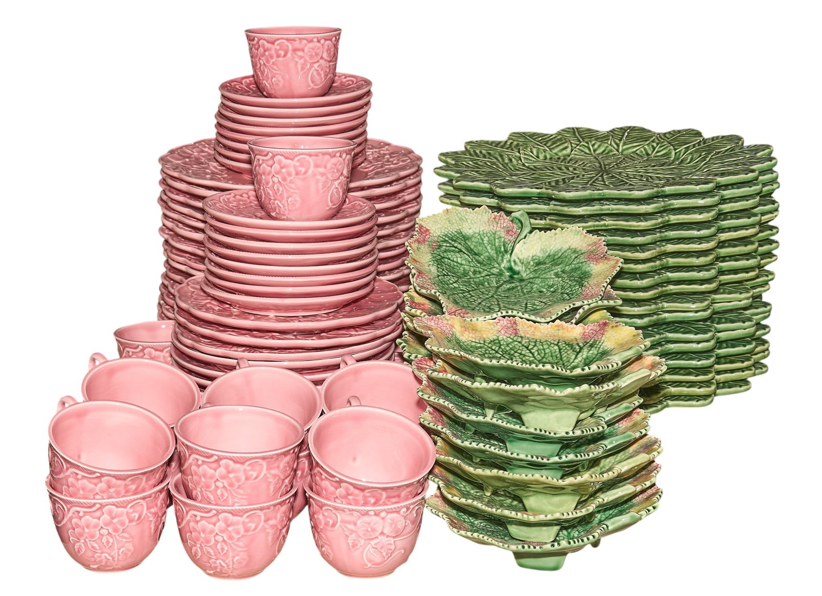 Collection of Pink and Green Bordallo Pinheiro Dishes: Collection of Bordallo Pinheiro ceramic pieces, includes Ingrid Pink pices, and green Grape Leaf pieces, marked on bottom length 13 in. x width 13 in. x depth 1 in. / largest Provenance: Property