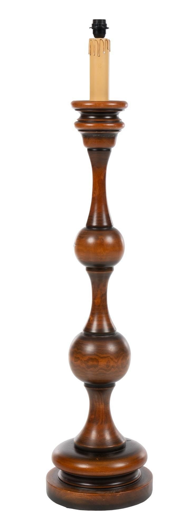 Turned Faux Candle Floor Lamp: Floor lamp, featuring turned wooden base, electric candle height 57 in. x diameter 12 in. Provenance: Property from a home in San Antonio, Texas