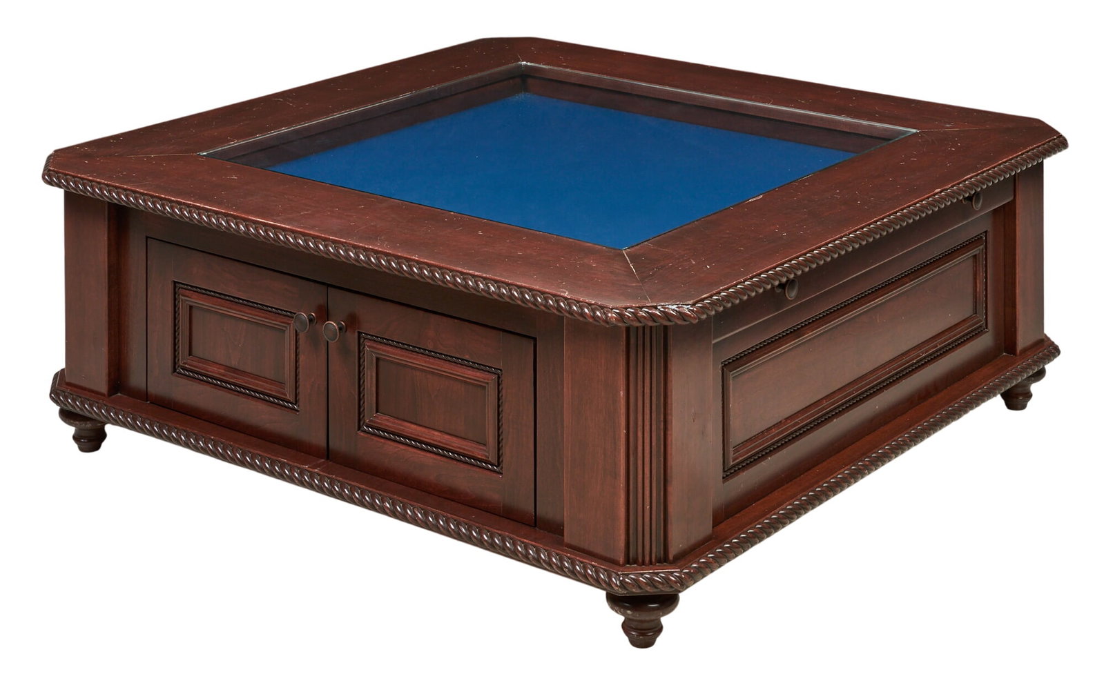 Square Vitrine Coffee Table: Square coffee table with blue felt-lined vitrine, featuring two cabinet doors and barley twist borders, on turned legs height 19 in. x width 51 in. x depth 51 in. Provenance: Property from the Estate