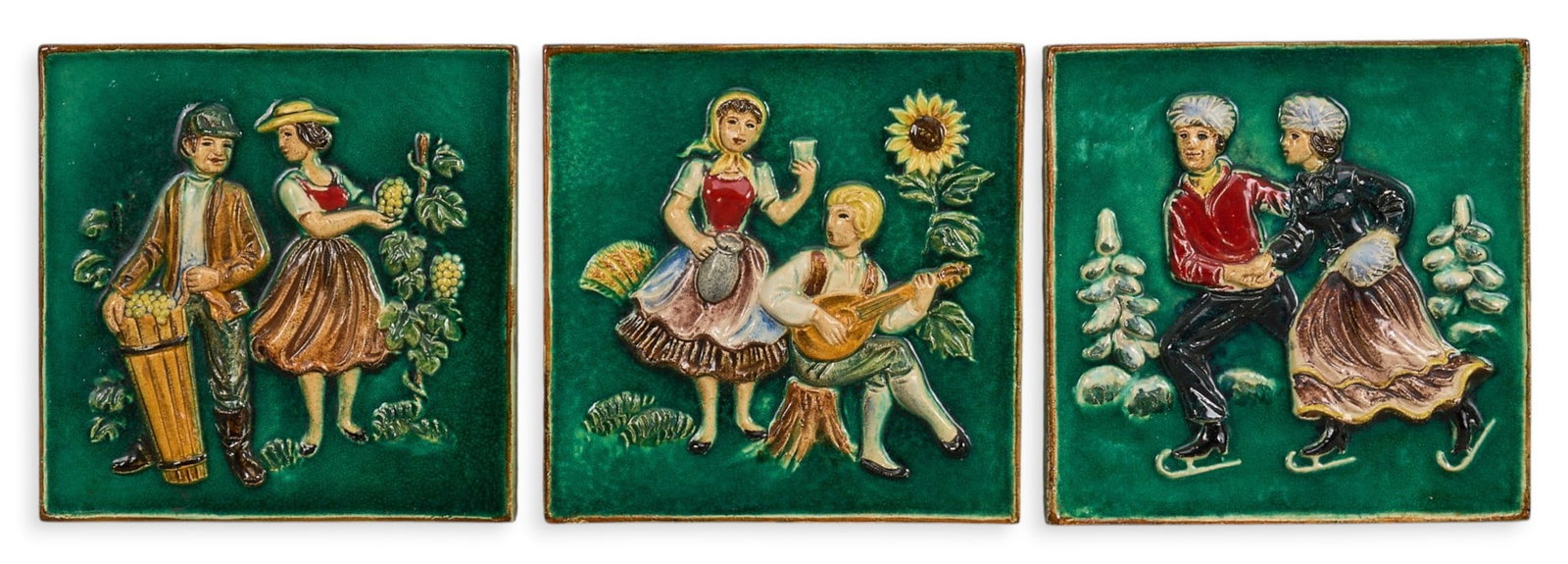 (3) German Pictorial Tiles: Set of three German pictorial porcelain tiles, depicting musician, grape harvest, and ice skating scenes, each stamped on the verso height 12 in. x width 12 in. / each Provenance: