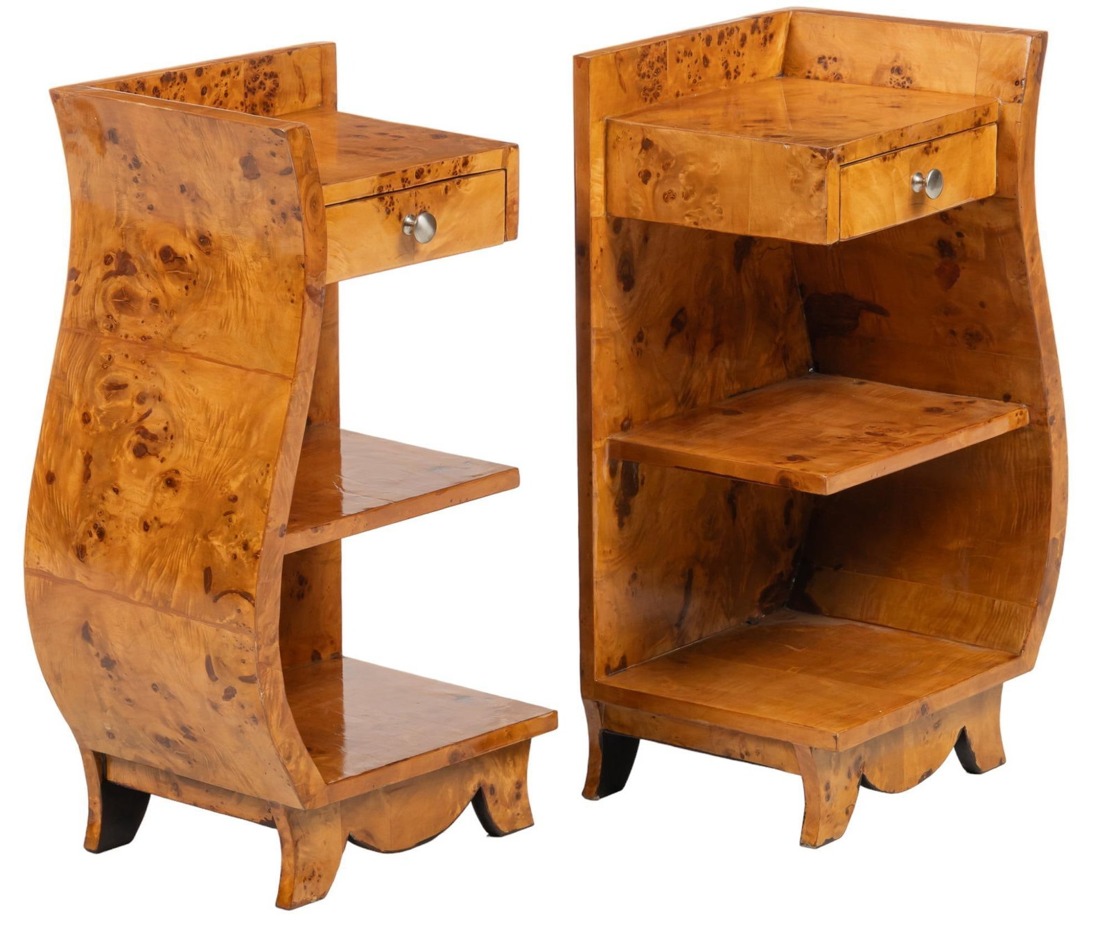 Pair of Art Moderne Nightstands: Pair of Art Moderne nightstands with burl wood veneer, single drawer, and open shelves height 28 in. x width 14 in. x depth 12 in. / each Provenance: Property from a home in San Antonio, Texas