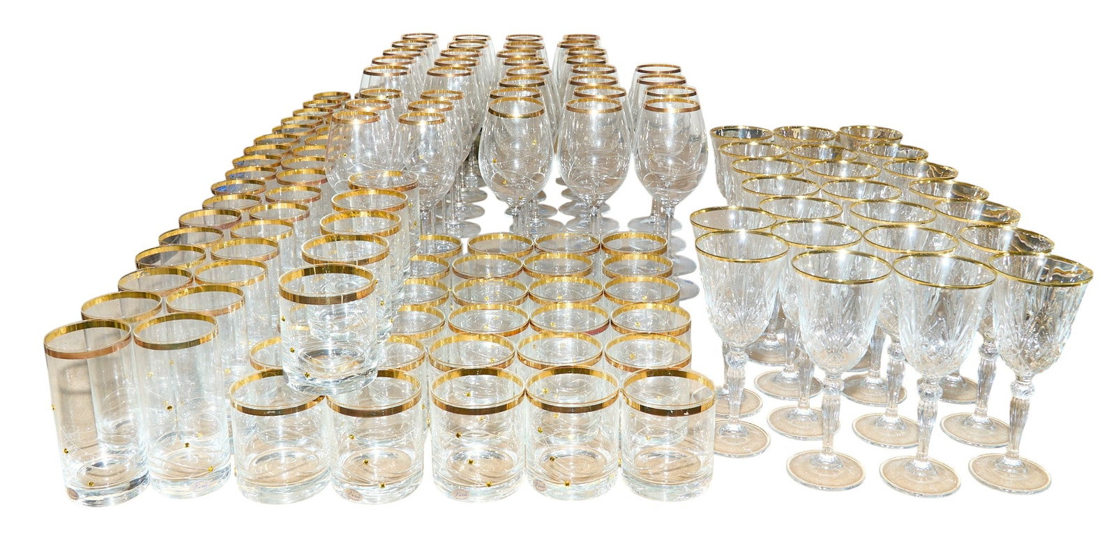 Gilt-Rim Glassware Collection: Collection of stemmed glassware with gilt rims, includes numerous, various pieces height 9.5 in. x width 3.5 in. x depth 3.5 in / largest Provenance: Property from the Estate of Robert A. "