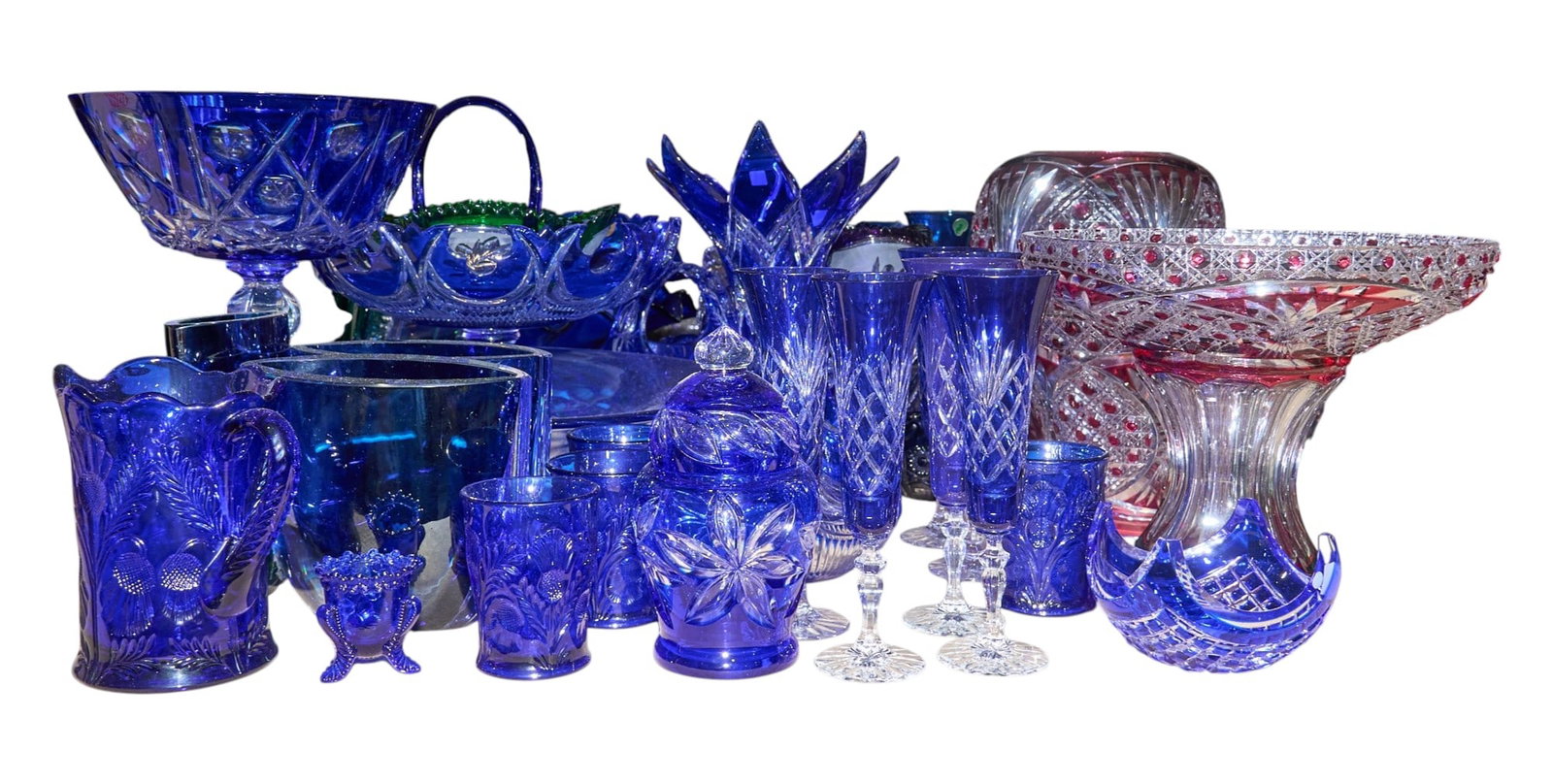 Large Collection of Cut Crystal and Colored Glassware: Large collection of cut crystal pieces and colored glassware, with numerous styles height 20 in. x width 9.5 in. x depth 9.5 in. / largest Provenance: Property from the Estate of Robert A. "Bob" Funk